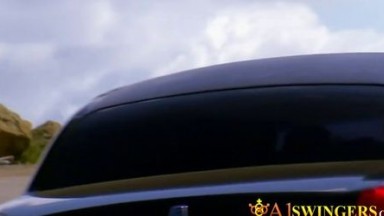 Swinger babe is enjoying to see how her husband enjoys a blowjob session in a foreplay