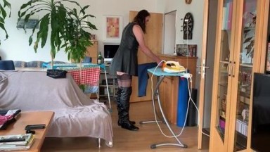 leather whore rubs her big cunt