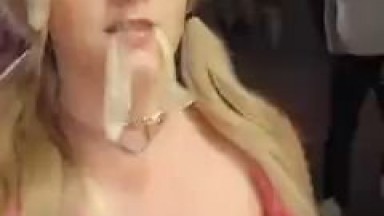 With a condom in her mouth and semen on her face, she walked among people.