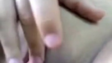 A young Indian girl is teasing her shaved pussy in a sex chat.