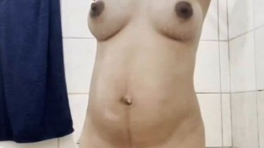 Indian girl Anjuman Bano takes a shower in front of the camera