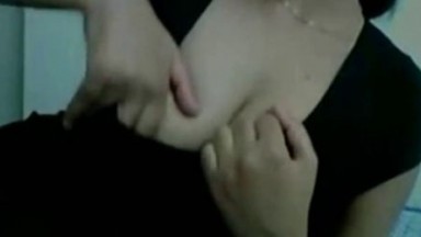 Horny girl flashes her melons on cam