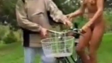 Riding her Bicycle outdoor