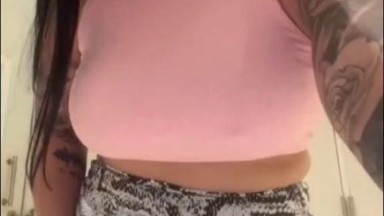 Brunette with a curvy body masturbates in the bathroom until she squirts